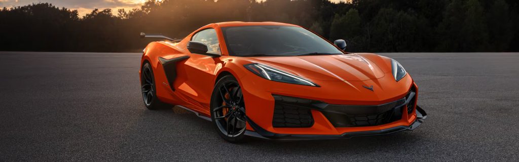 Corvette Z06 standing in the ground during sunset.