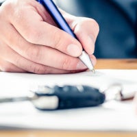 person signing papers